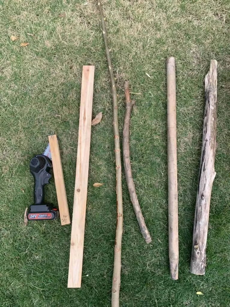 Portable chainsaw and various wood pieces